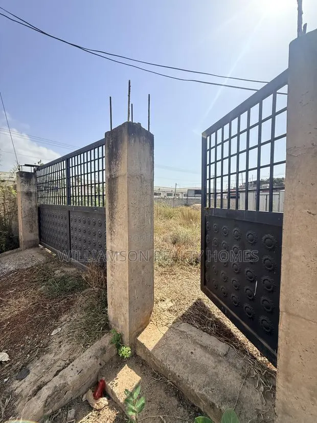 Documented Road Side, Walled & Gated Full Plot of Land 4sale,spintex · Photo 1