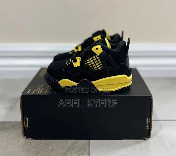 Nike Air Jordan 4 Retro Thunder Sneaker Available · Photo 1