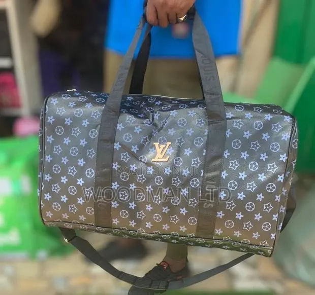 LV Leather Luggage Bag · Photo 1