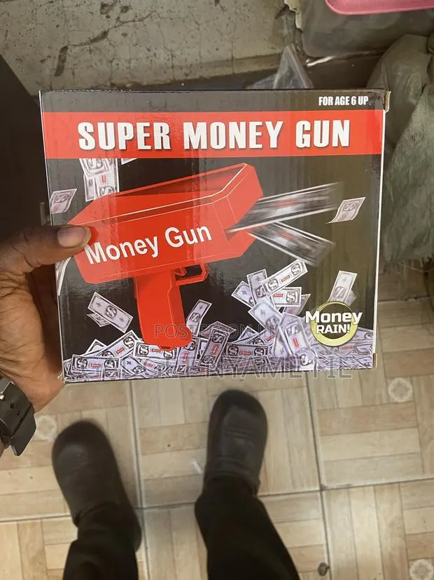 Supreme Money Spray Gun With Fake Dollars · Photo 1