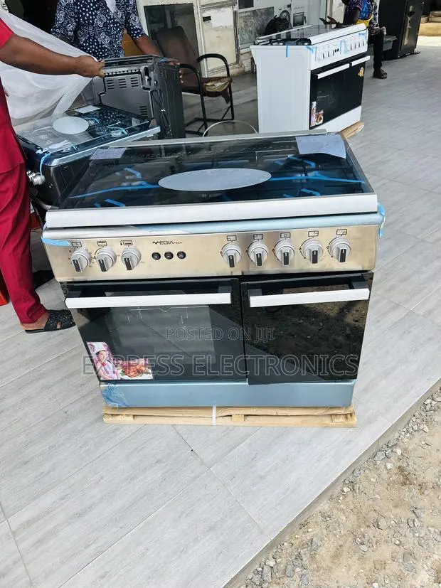 A New Gas Cooker Oven Rotisserie Grill 5burner 60/90 Midea Tech · Photo 1