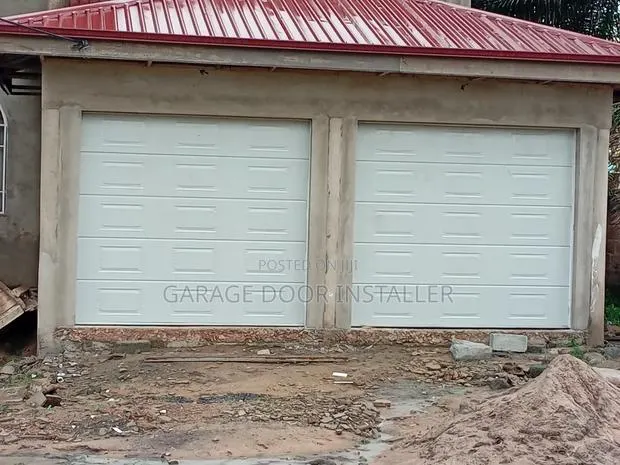 Garage Door With Motor and Remote · Photo 1