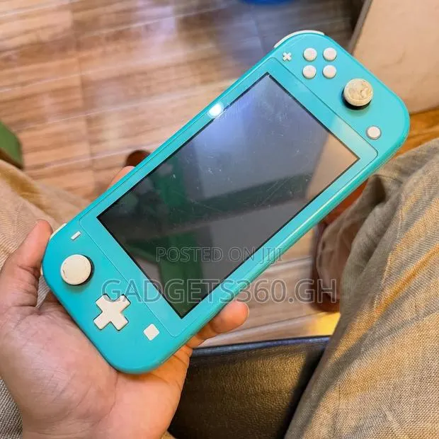 Nintendo Switch Lite 32gb (Turquoise Green) · Photo 1