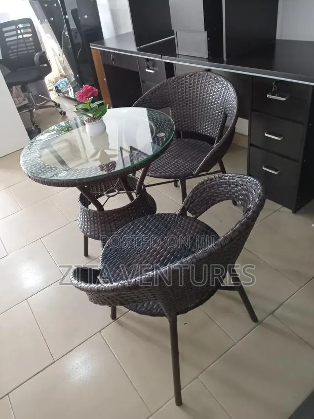 Cute Wooven Dining Set With Plain Glass Table · Photo 1