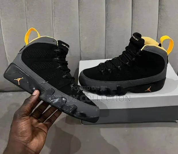 Jordan 9 Retro Dark Charcoal University Gold · Photo 1