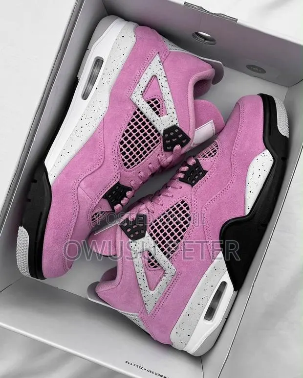 Pink Jordan 4 Retro Sneakers · Photo 1