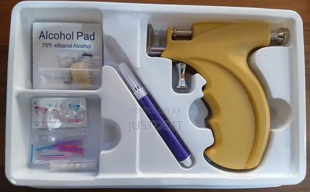 Piercing Gun and It's Needles · Photo 1