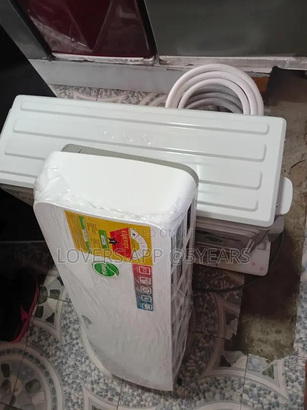 1.5hp Rainbow Icecool White Window Ac -Ultimate Comfort. · Photo 1