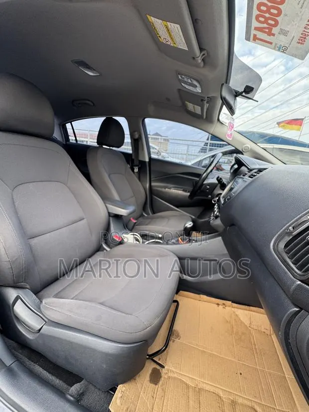 Kia Rio LX 4dr Sedan (1.6L 4cyl 6M) 2015 Gray · Photo 1