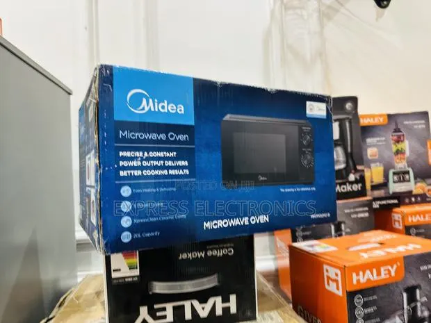 Text Us Fir Your Midea Microwave Oven 20l · Photo 1