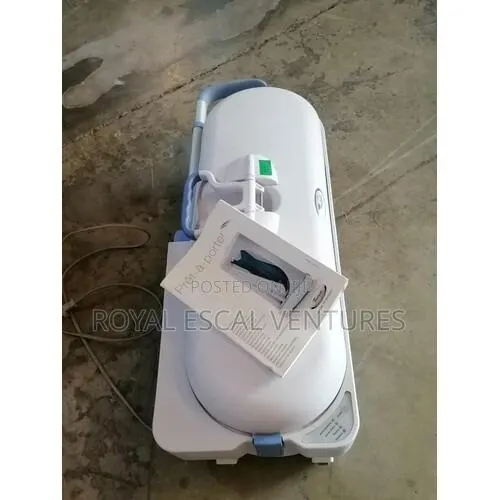 Garment Steamer and Fabric Freshener · Photo 1