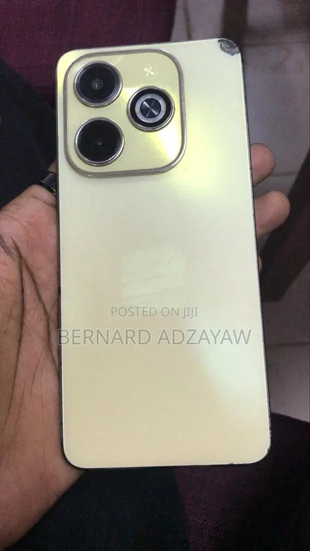 Infinix Hot 40i 128 GB Gold · Photo 1