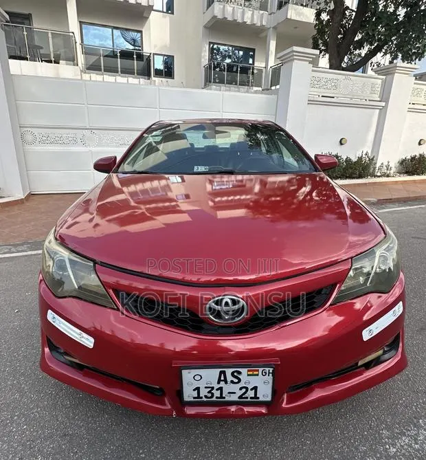 Toyota Camry SE 4dr Sedan w/Prod. End 11/13 (2.5L 4cyl 6A) 2014 Red · Photo 1