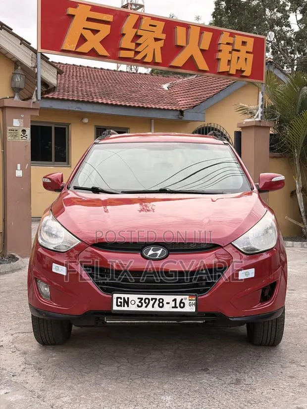 Hyundai Tucson 2013 Red · Photo 1