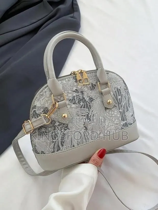Women’s Mini Dome Top-Handle Crossbody Bag · Photo 1