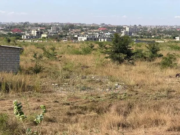 Buy Titled Land in Afienya Tor Estate · Photo 1