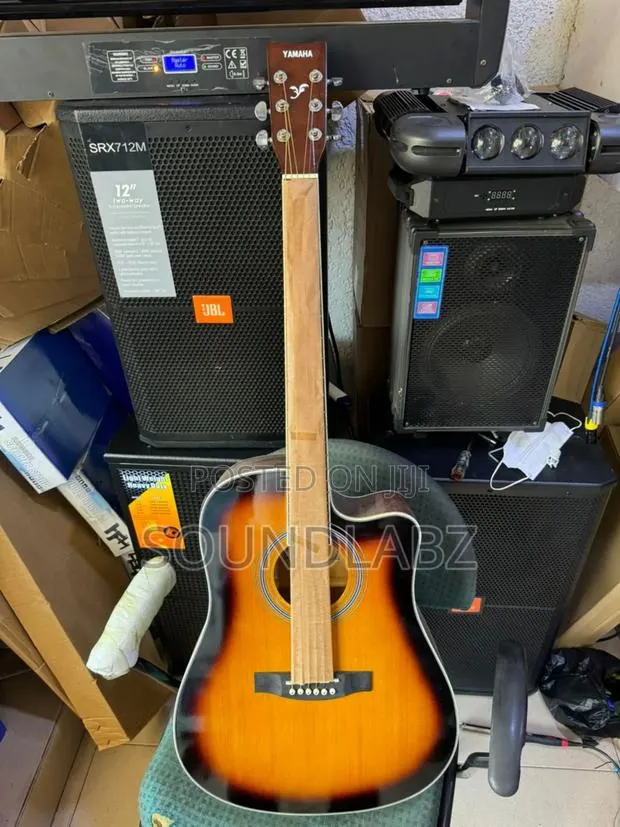 Brown Yamaha Semi-Acoustic Guitar · Photo 1