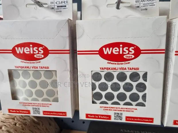 Adhesive Screw Cover (Weiss Tape) · Photo 1