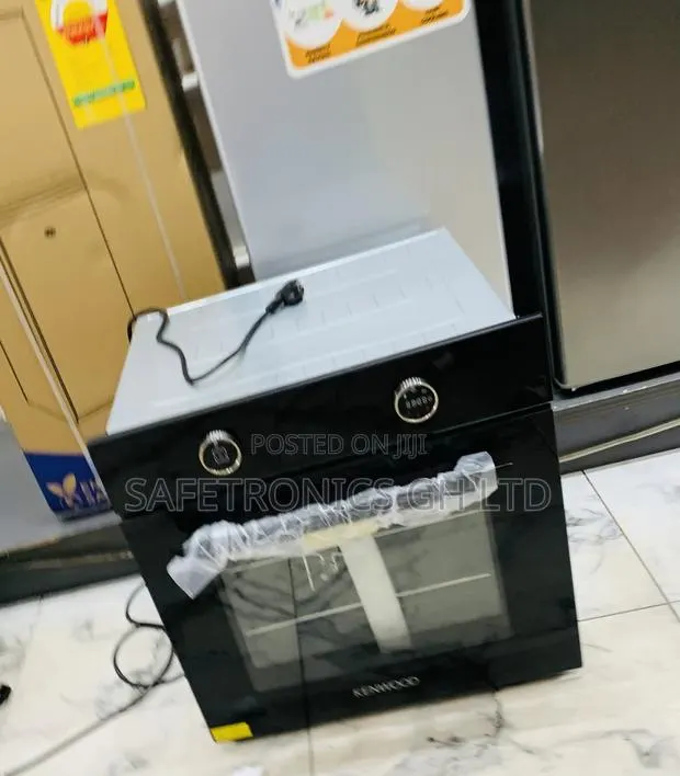 Neatly Sealed Black Sleek Kenwood Electric Ovens · Photo 1