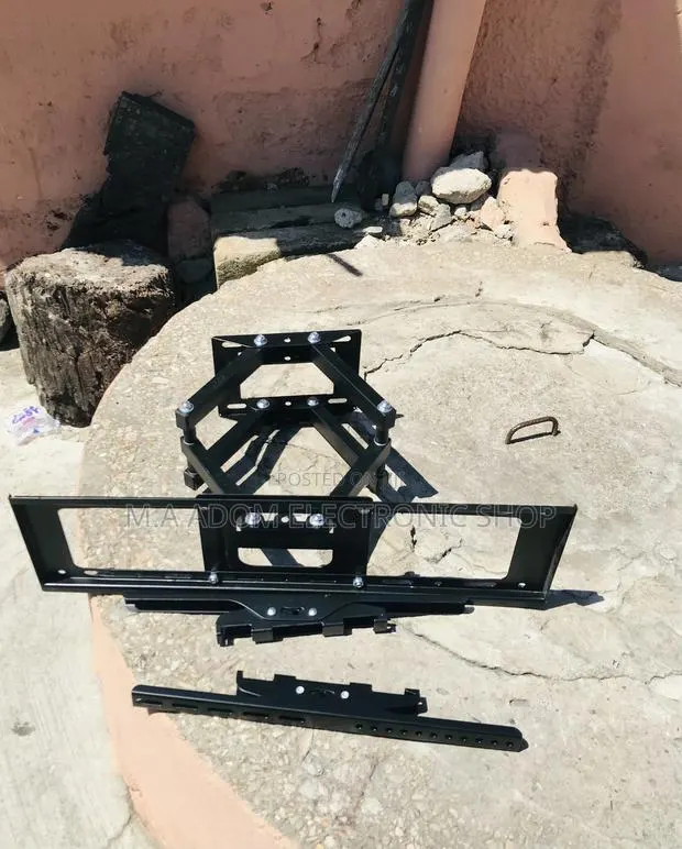Order Affordable Adjustable Wall Mount for 32”-80” Tv. · Photo 1