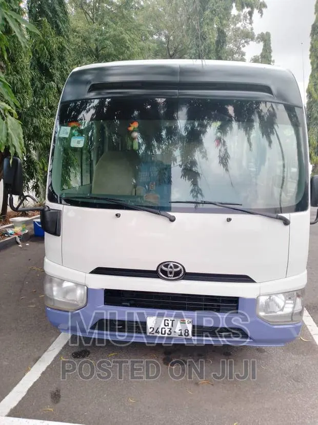 Car Rental. Toyota Coaster Bus for Rent · Photo 1