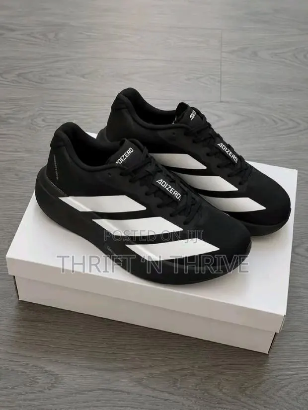 Black and White Adizero Running Shoes · Photo 1