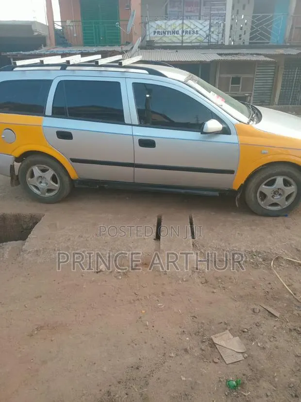 Opel Astra 1998 Silver · Photo 1
