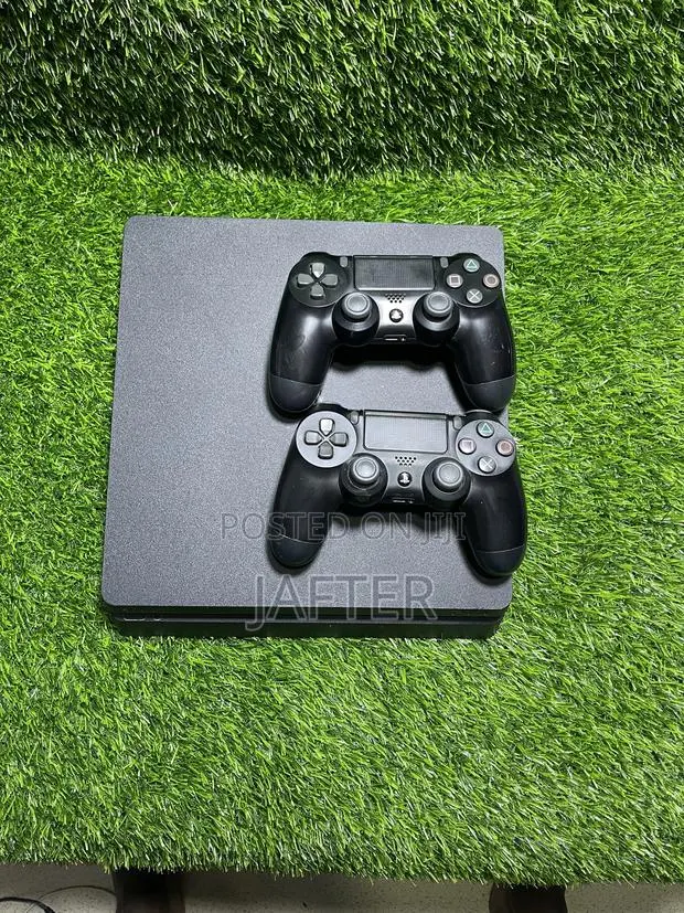 Sony Ps4 Slim Loaded With FC 27 and Other 10 Latest Games · Photo 1