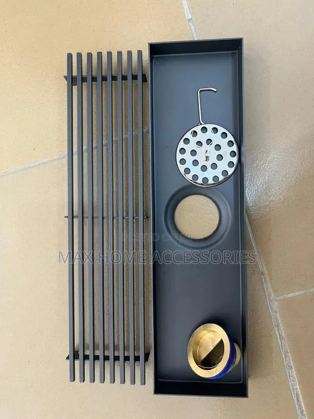Long Black Floor Drain · Photo 1