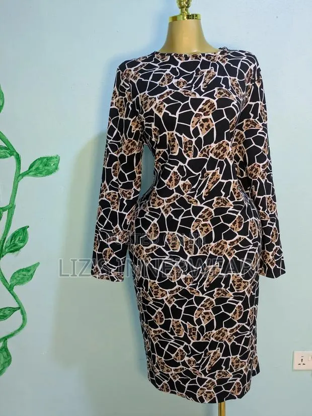 Long Sleeve Bodycon Midi Dress · Photo 1
