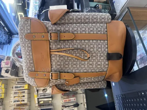 League Flap Laptop Backpack in Signature · Photo 1