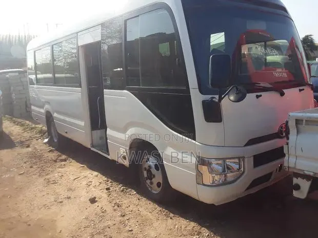Toyota Coaster 2018 Grey · Photo 1