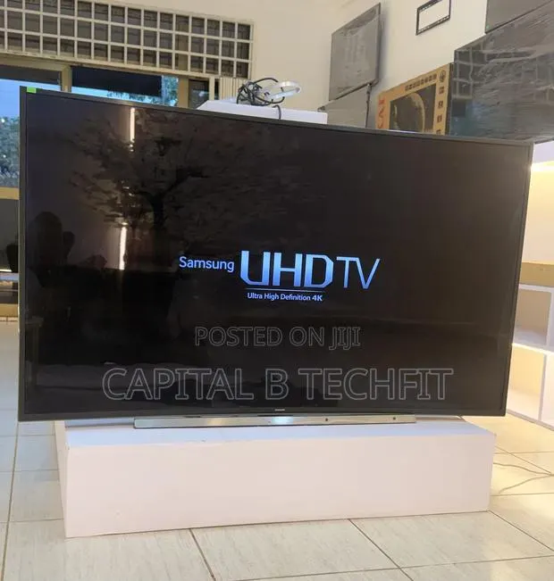 65inches Samsung Uhd HDR Smart Curved TV · Photo 1