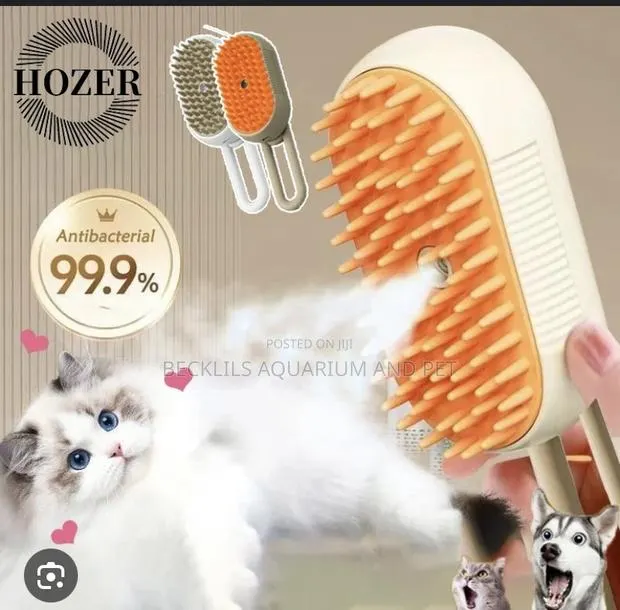 2 in 1 Dog and Cat Grooming Steam Brush · Photo 1