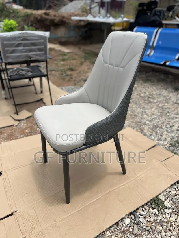 High-Back Faux Leather Dining Chair · Photo 1