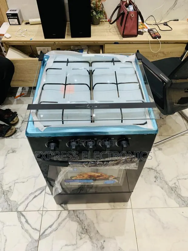 Place Your Order for Midea 4burner Gas Cooker Oven Blavk · Photo 1