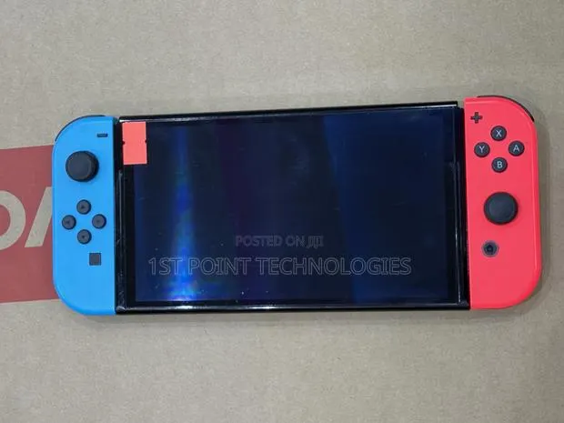 Used Nintendo Switch Oled With 10games · Photo 1