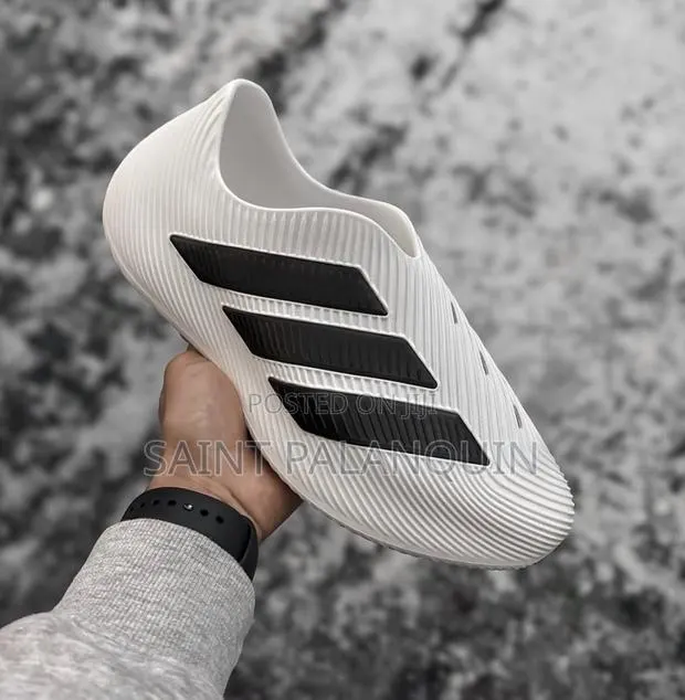 The White Adidas Purechill Slip-on Recovery Shoes a Ridged Molded · Photo 1