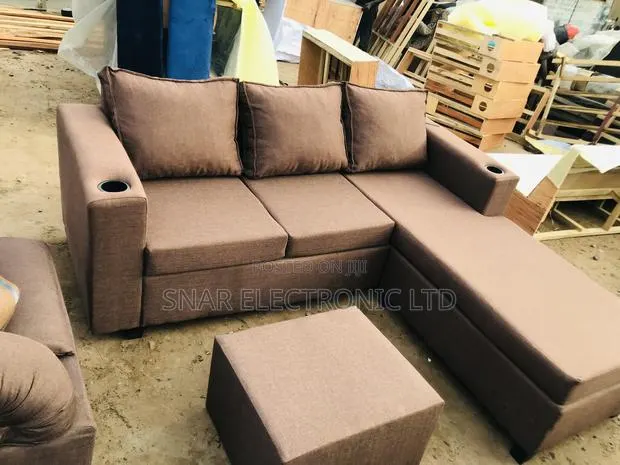 Originally Brown L Shape Sofas Plus Table · Photo 1