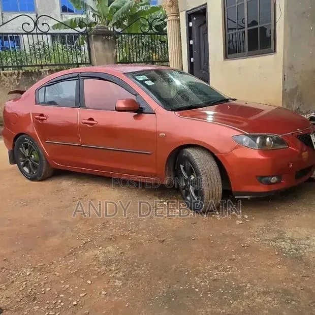 Mazda 3 2.0 i Sport 2010 Orange · Photo 1