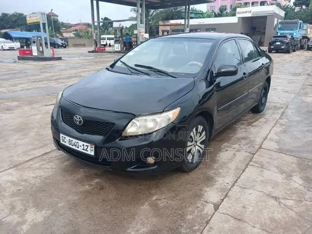 Toyota Corolla LE 4dr Sedan (1.8L 4cyl 4A) 2010 Black · Photo 1