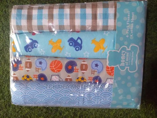 Coloured Cot Sheets · Photo 1
