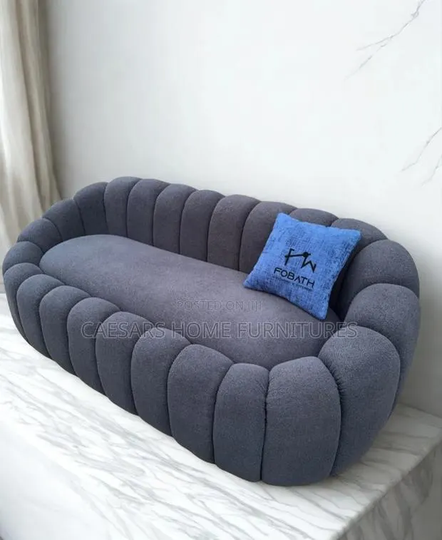 New Grey Three Seater Sofa · Photo 1