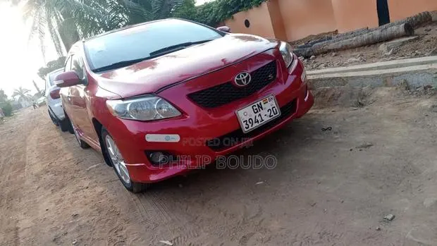 Toyota Corolla 2009 Red · Photo 1
