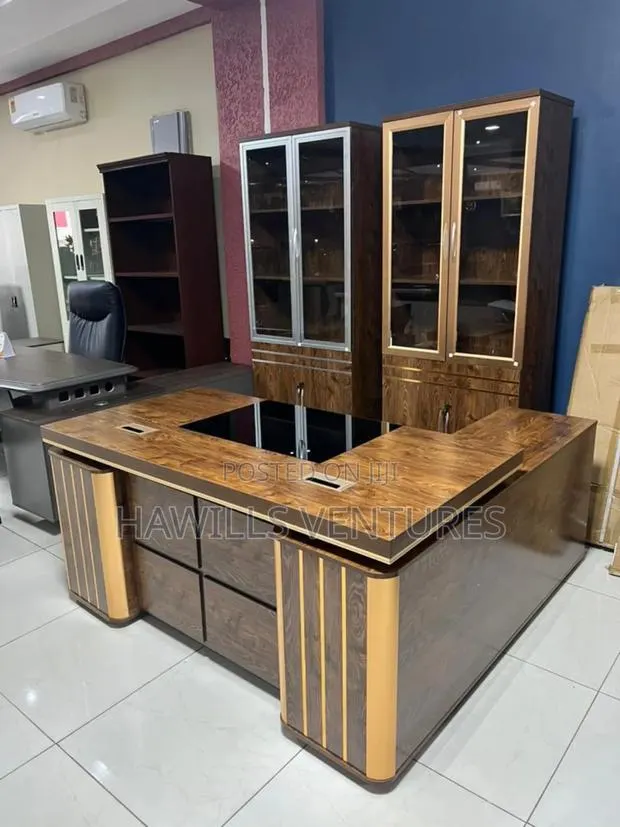 L Shape Executive Office Desk With a Wood Finish. · Photo 1