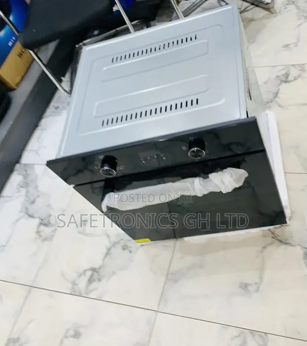 Just Order Sleek Black Kenwood Electric and Gas Ovens · Photo 1
