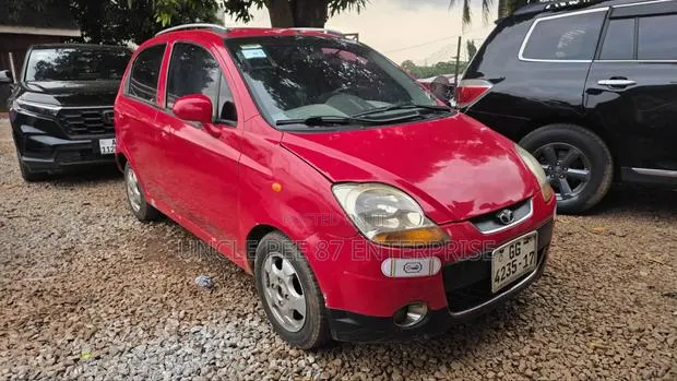 Chevrolet Matiz 2010 Red · Photo 1
