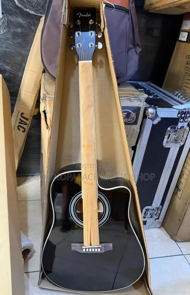 Fender Brand Acoustic Guitar With a Glossy Black Finish. · Photo 1