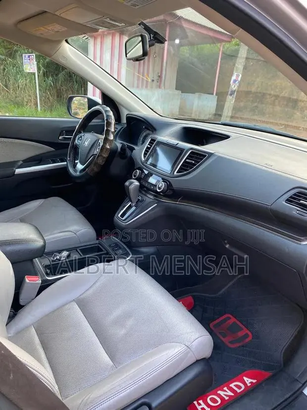 Honda CR-V Touring 4dr SUV AWD (2.4L 4cyl CVT) 2016 Silver · Photo 1