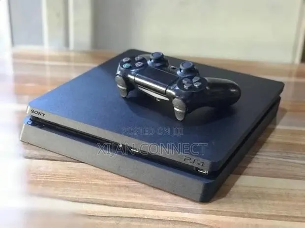 Playstation Four (Ps4) Slim With Games Installed · Photo 1